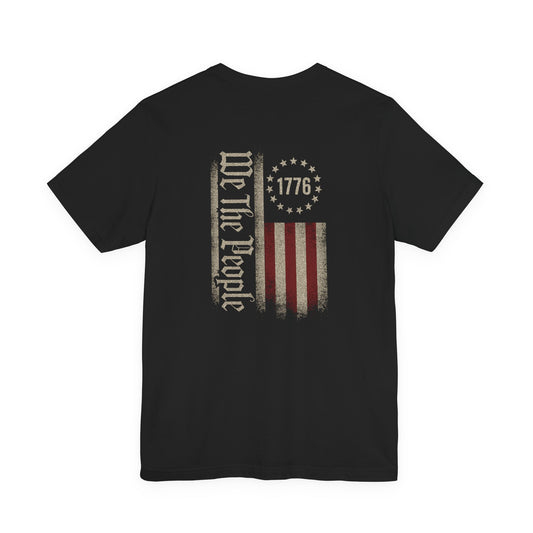 Black t-shirt with 'We The People' and 1776 design on a white background