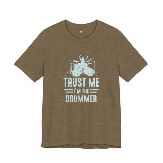 Green t-shirt with white graphic and text 'Trust Me I'm the Drummer' on a white background