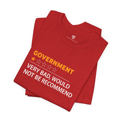 Folded red t-shirt with humorous text design on a white background