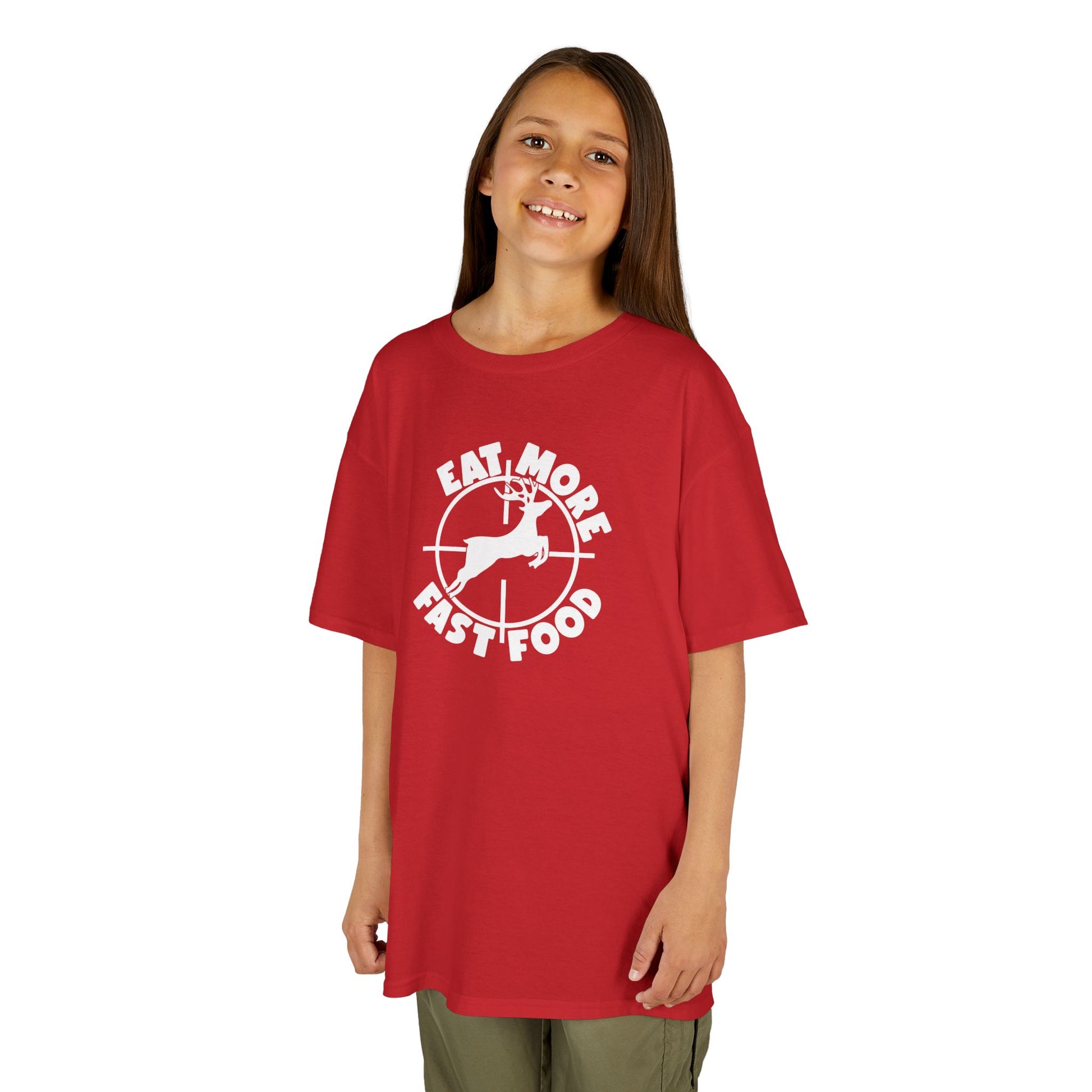 Child wearing a red t-shirt with a graphic design on a white background
