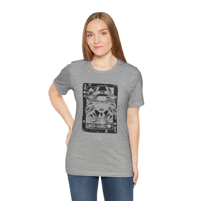 Woman wearing a gray t-shirt with a graphic design on a white background