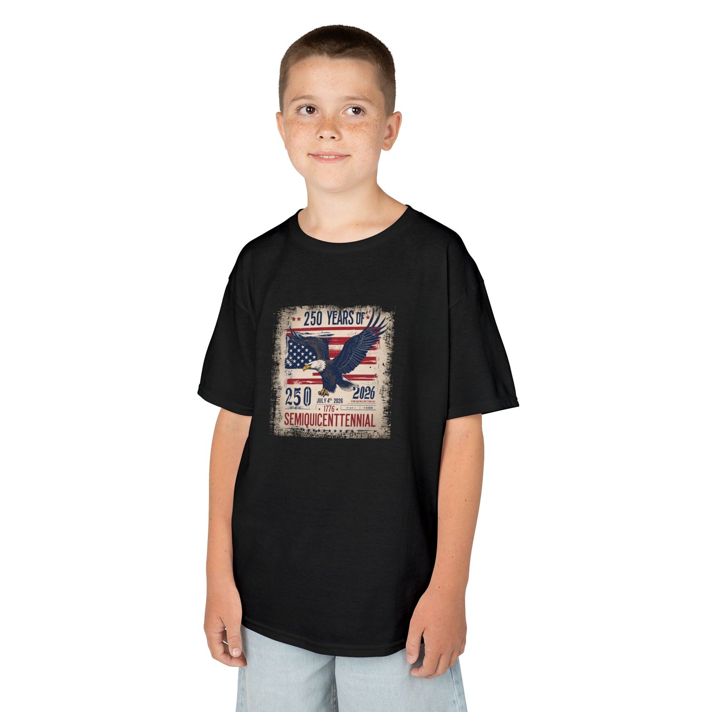 Child wearing a black t-shirt with a graphic design on a white background