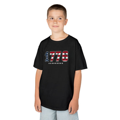 Child wearing a black t-shirt with a motivational message on a white background