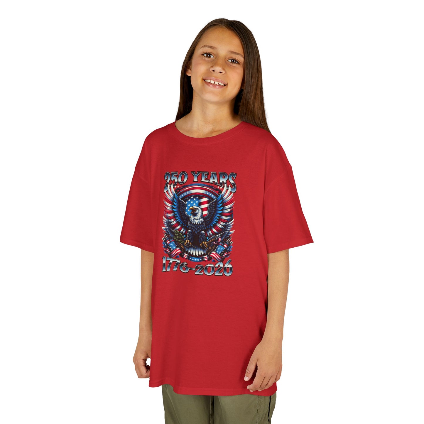 Child wearing a red t-shirt with a graphic design on a white background