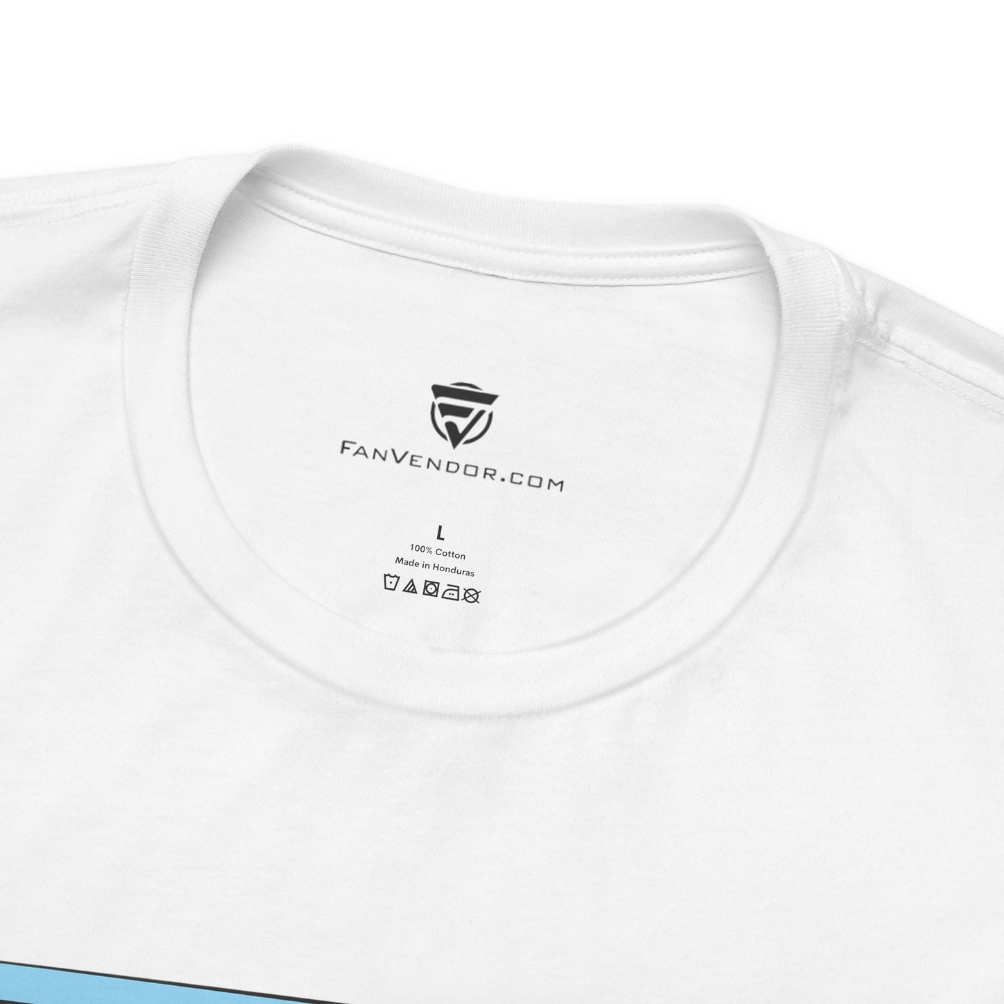 Close-up of a white t-shirt with 'FanVendor.com' branding and label details.