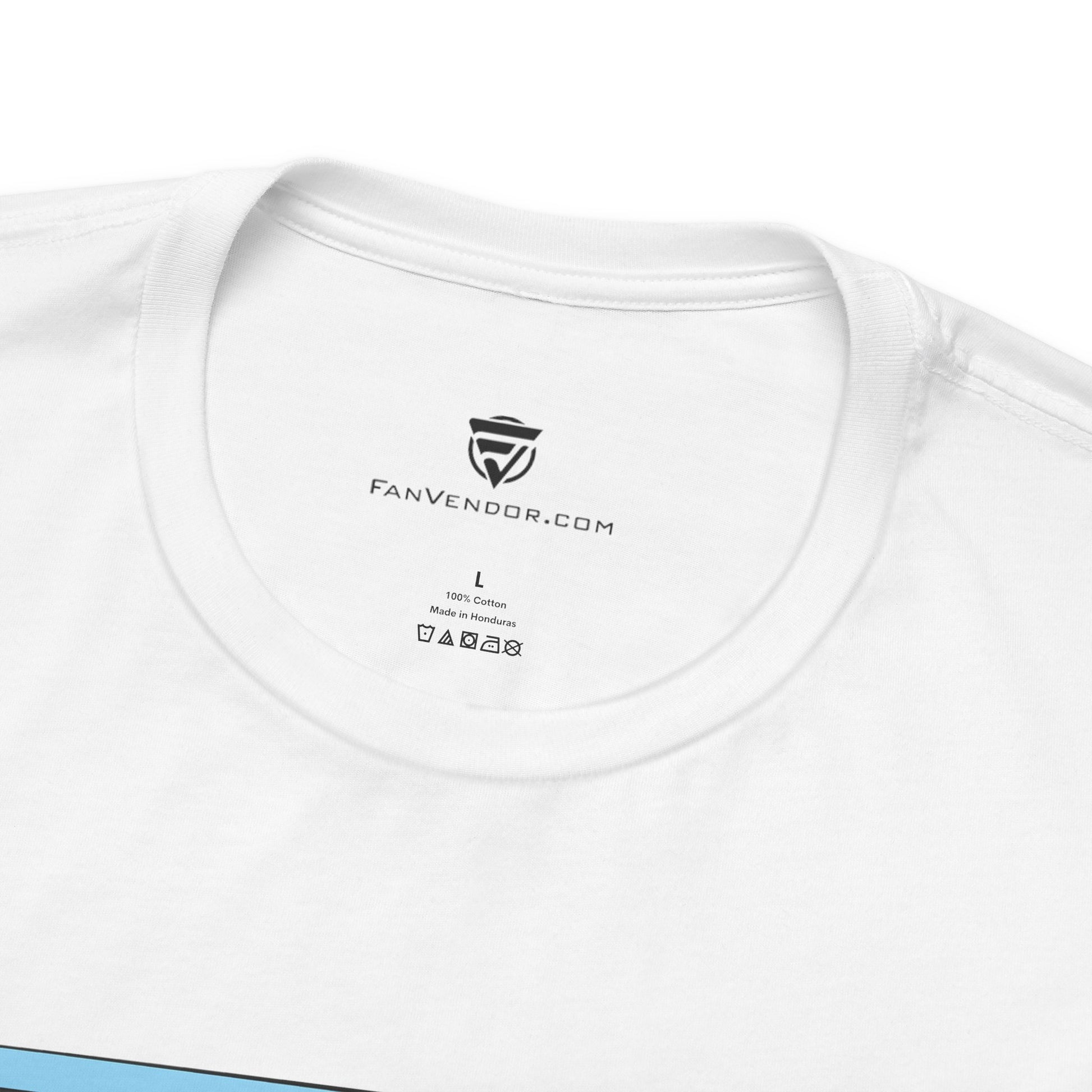 Close-up of a white t-shirt with 'FanVendor.com' branding and label details.