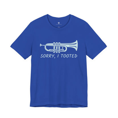 Blue t-shirt with a white trumpet graphic and text on a white background
