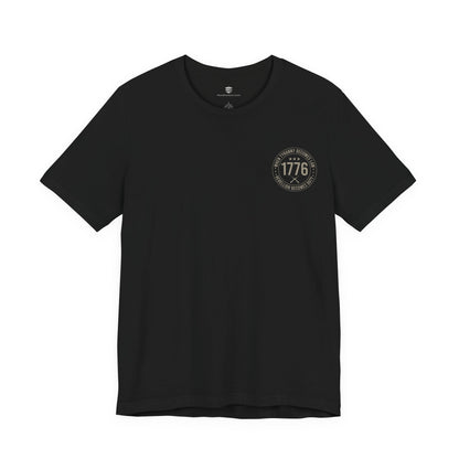 Black t-shirt with a circular logo on a white background
