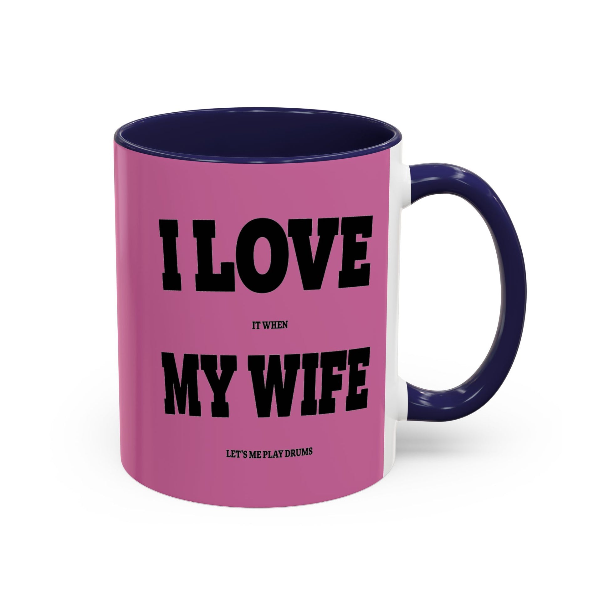 Pink mug with purple interior and handle, featuring text on a white background