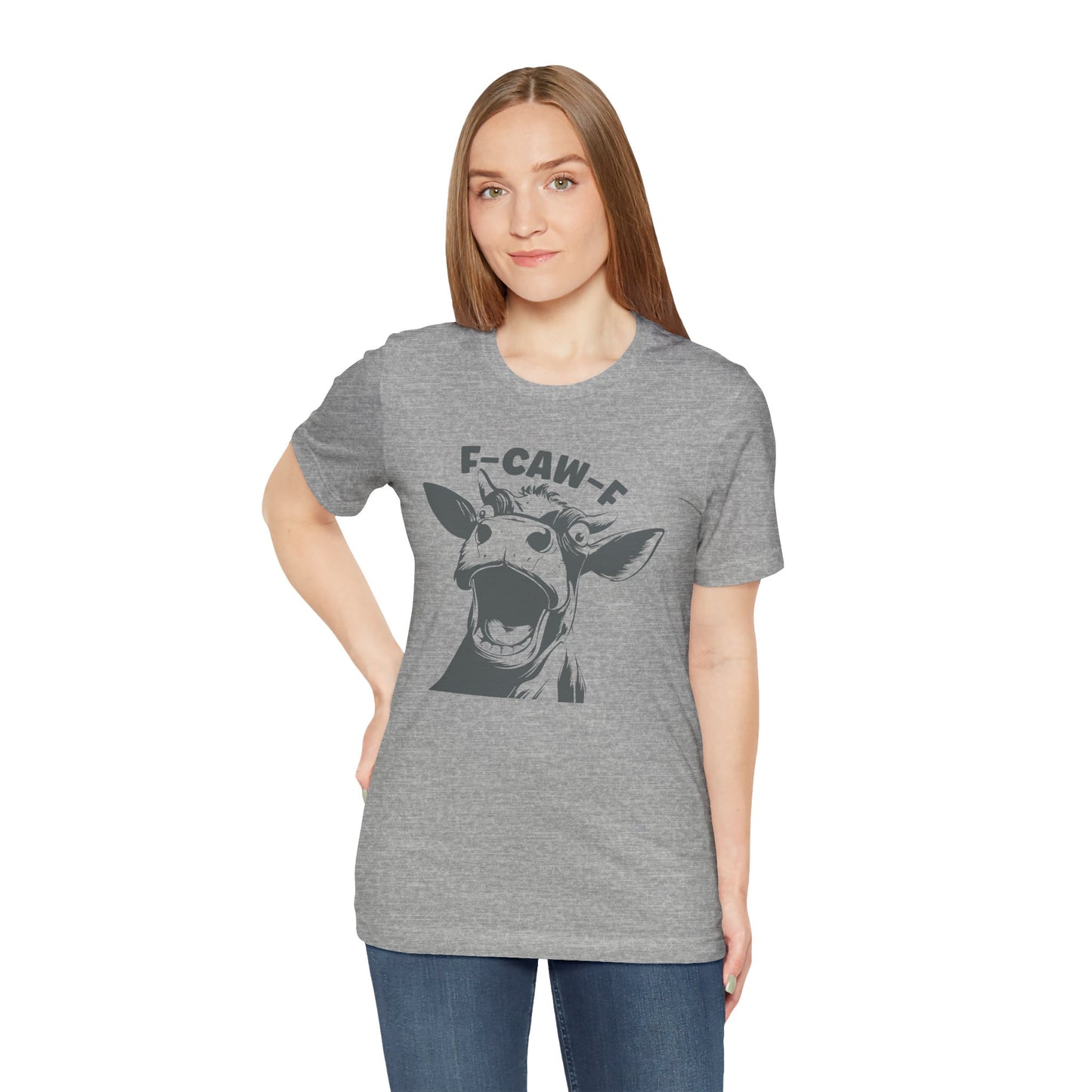 Woman wearing a gray t-shirt with a graphic design 
