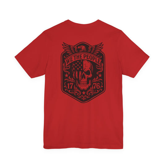 Red t-shirt with black graphic design on the back featuring a skull and text.