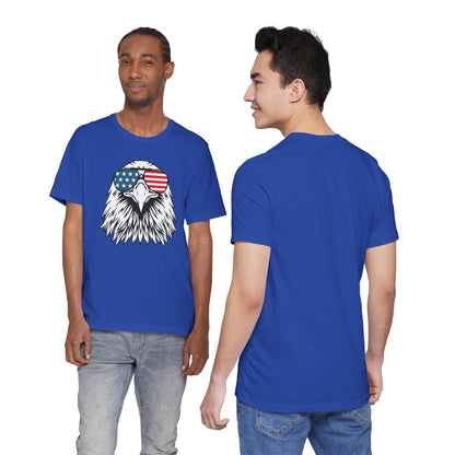 Blue t-shirt with an eagle design featuring an American flag, worn by two models on a white background.