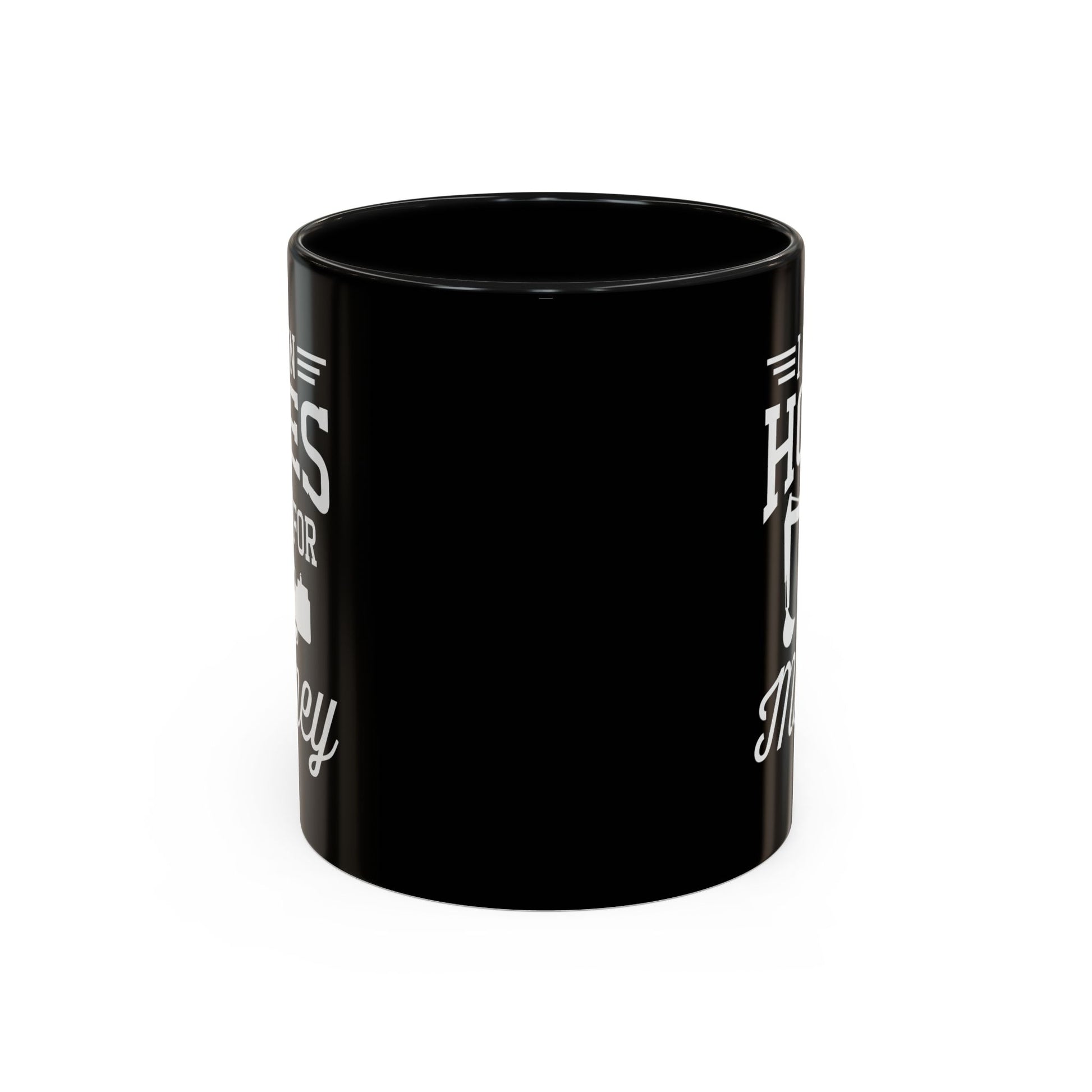 Black mug with white text on a white background