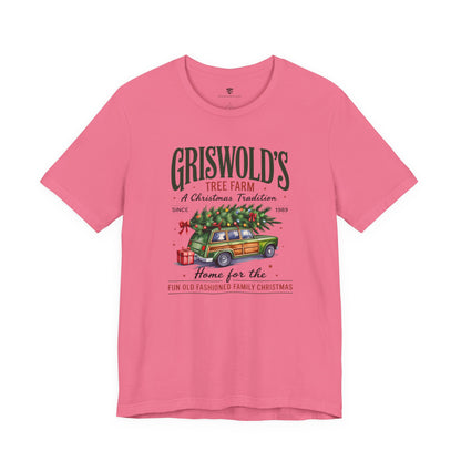 Pink t-shirt with Christmas-themed graphic and text on a white background