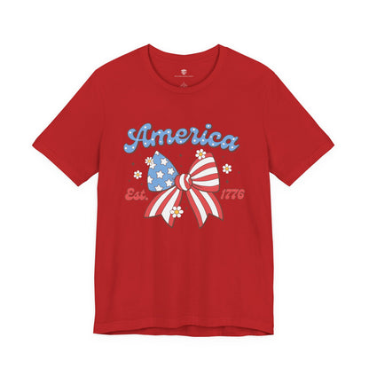Red t-shirt with 'America' and a bow design on a white background