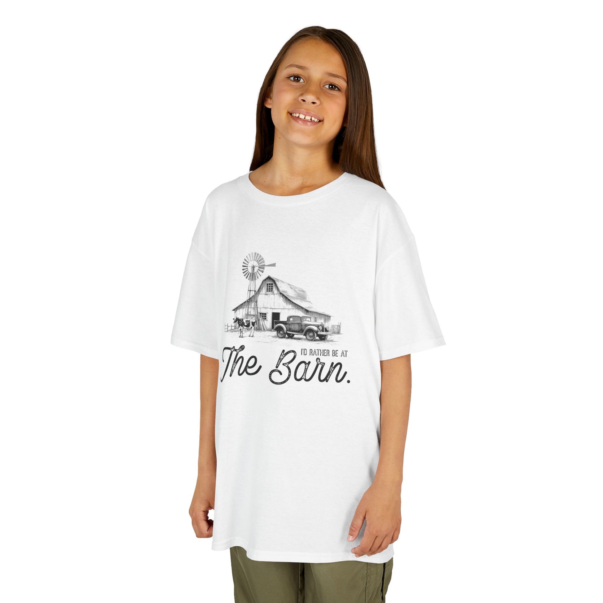 Child wearing a white t-shirt with text and graphic on a white background