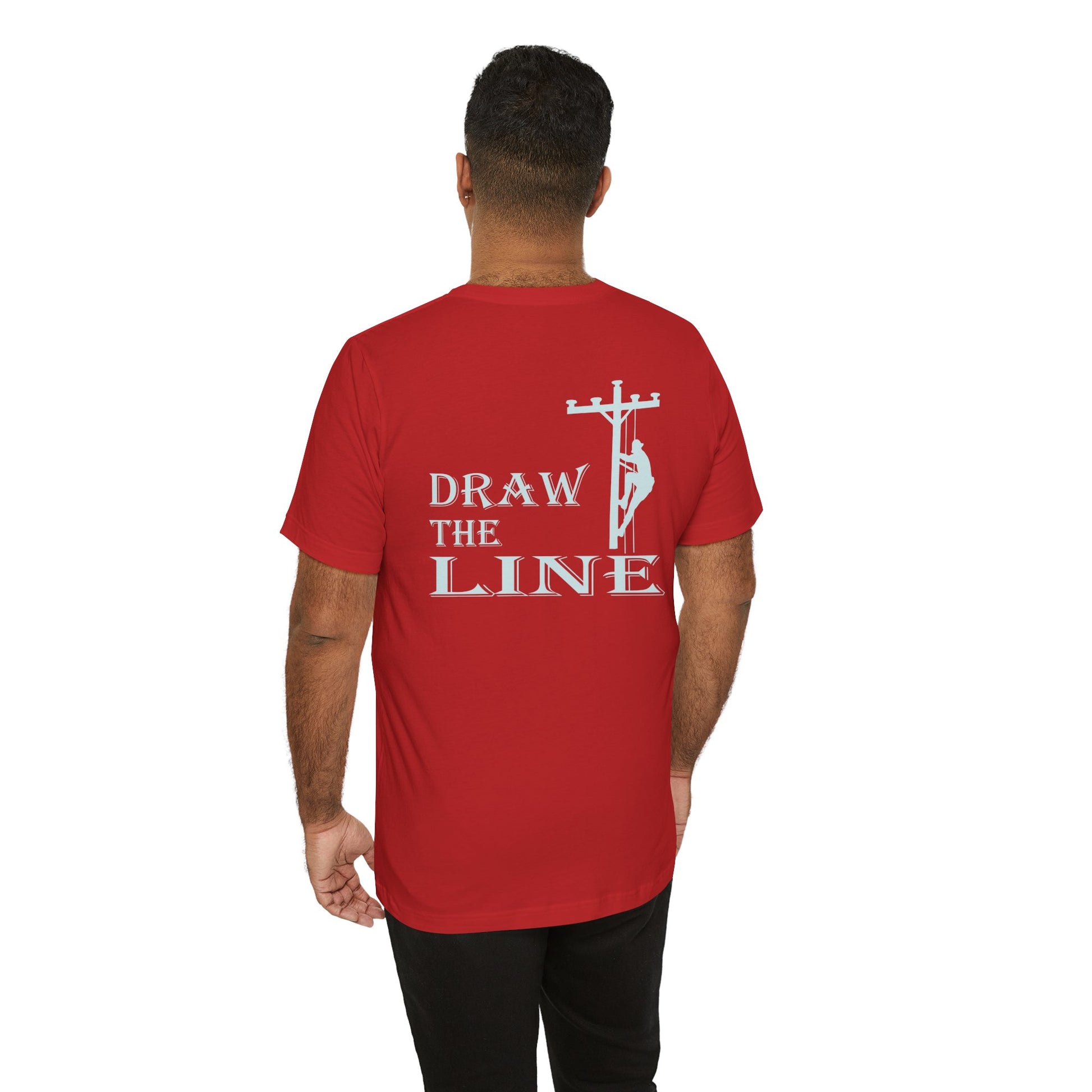 Person wearing a red t-shirt with 'Draw the Line' text and graphic on the back, on a white background