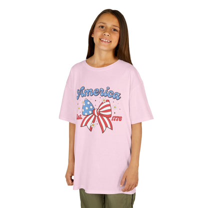 Girl wearing a pink t-shirt with a bow and 'America' text on a white background