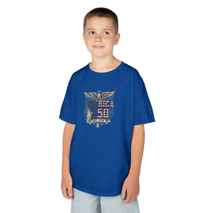 Child wearing a blue t-shirt with a graphic design on a white background