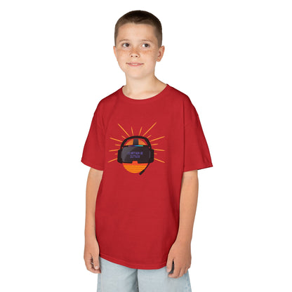 Child wearing a red t-shirt with a graphic design on a white background