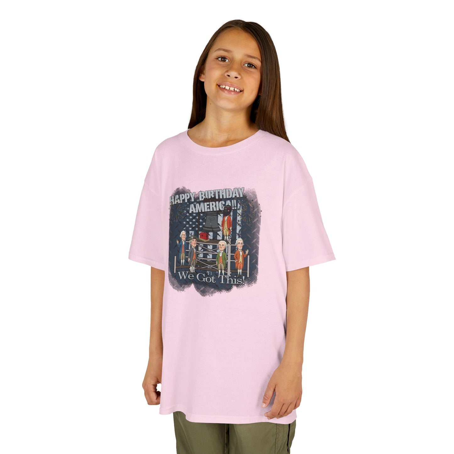 Young girl wearing a pink t-shirt with a graphic design on a white background