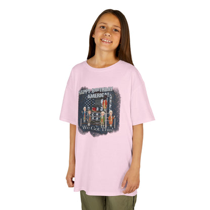 Young girl wearing a pink t-shirt with a graphic design on a white background