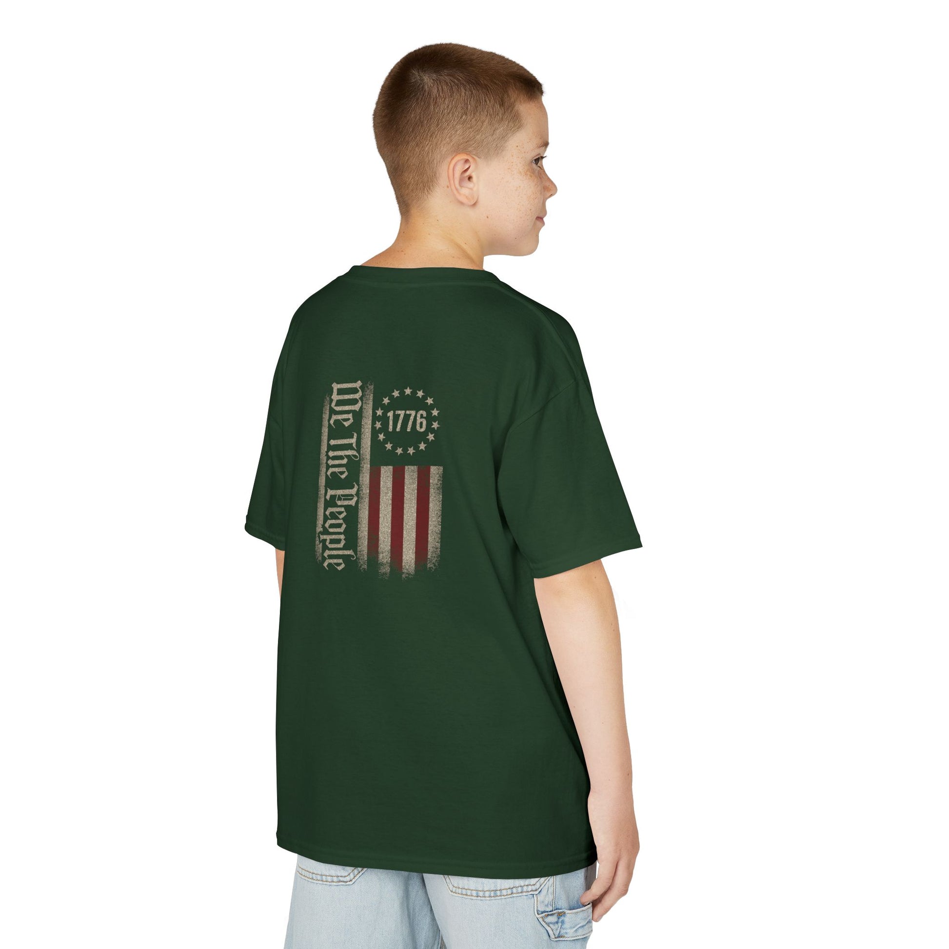 Child wearing a green t-shirt with a logo on the back against a white background