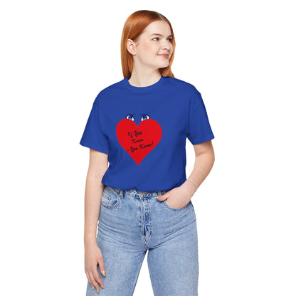 Person wearing a blue t-shirt with a red heart design on a white background