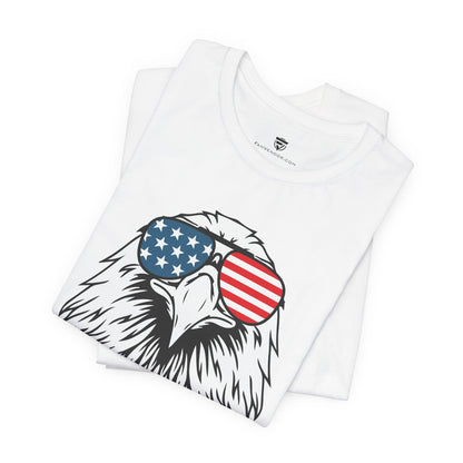 White t-shirt with an eagle wearing American flag sunglasses design on a white background