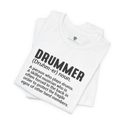 White t-shirt with black text definition of a drummer on a white background