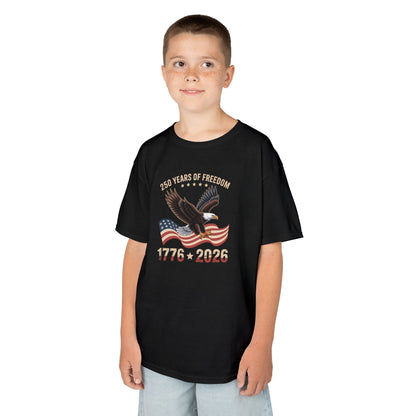 Child wearing a black t-shirt with a colorful design on a white background