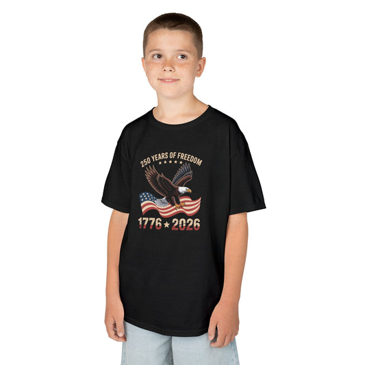 Child wearing a black t-shirt with a colorful design on a white background