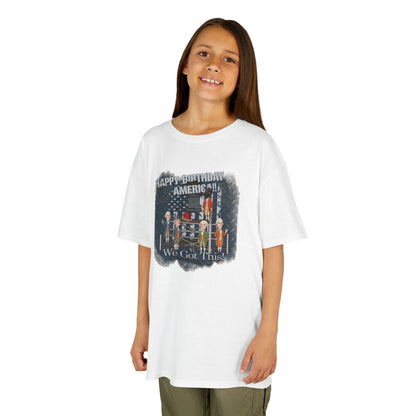 Young girl wearing a white t-shirt with a graphic design on a white background