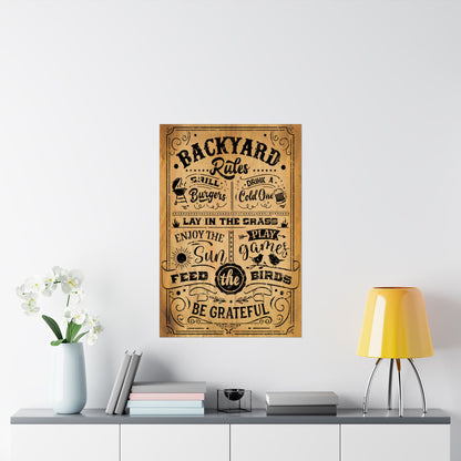 Decorative poster titled 'Backyard Rules' on a wall above a shelf with a lamp and books.