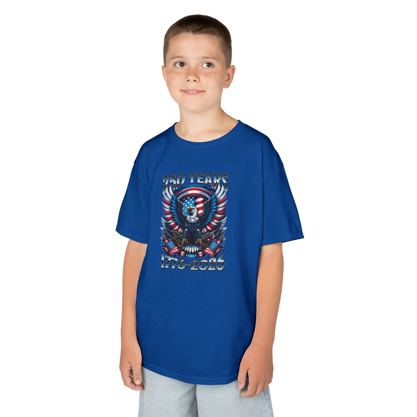 Child wearing a blue t-shirt with a graphic design on a white background