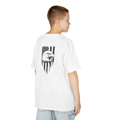 Child wearing a white t-shirt with an eagle and flag design on the back, standing against a white background.