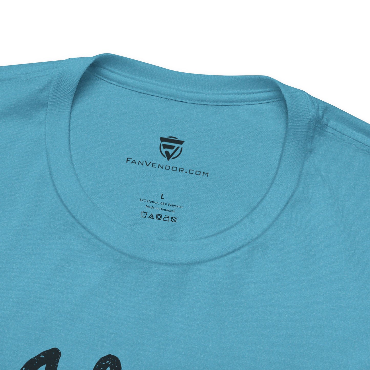Close-up of a blue t-shirt with 'FanVendor.com' logo and text 