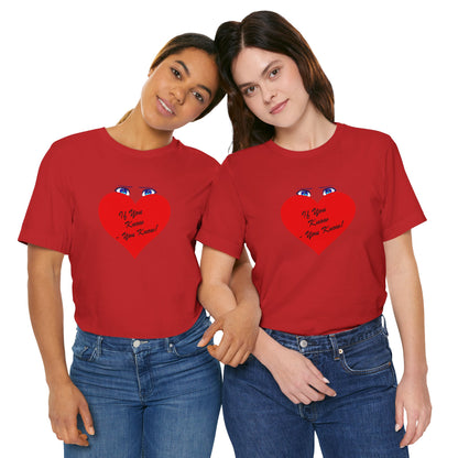 Two people wearing red t-shirts and blue jeans on a white background