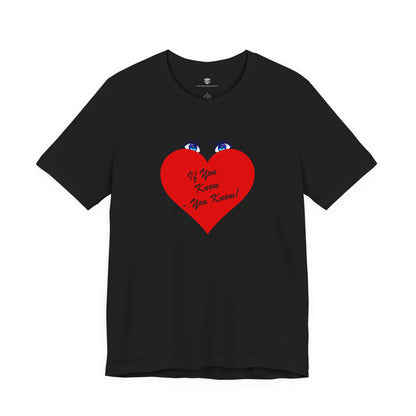Black t-shirt with colorful text design on a white background