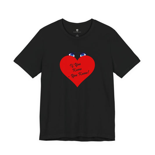 Black t-shirt with colorful text design on a white background