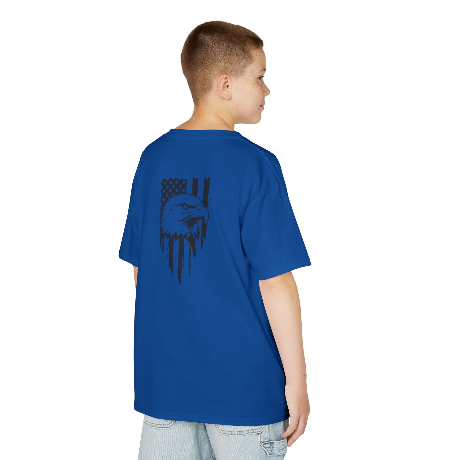 Child wearing a blue t-shirt with a graphic design on the back against a white background