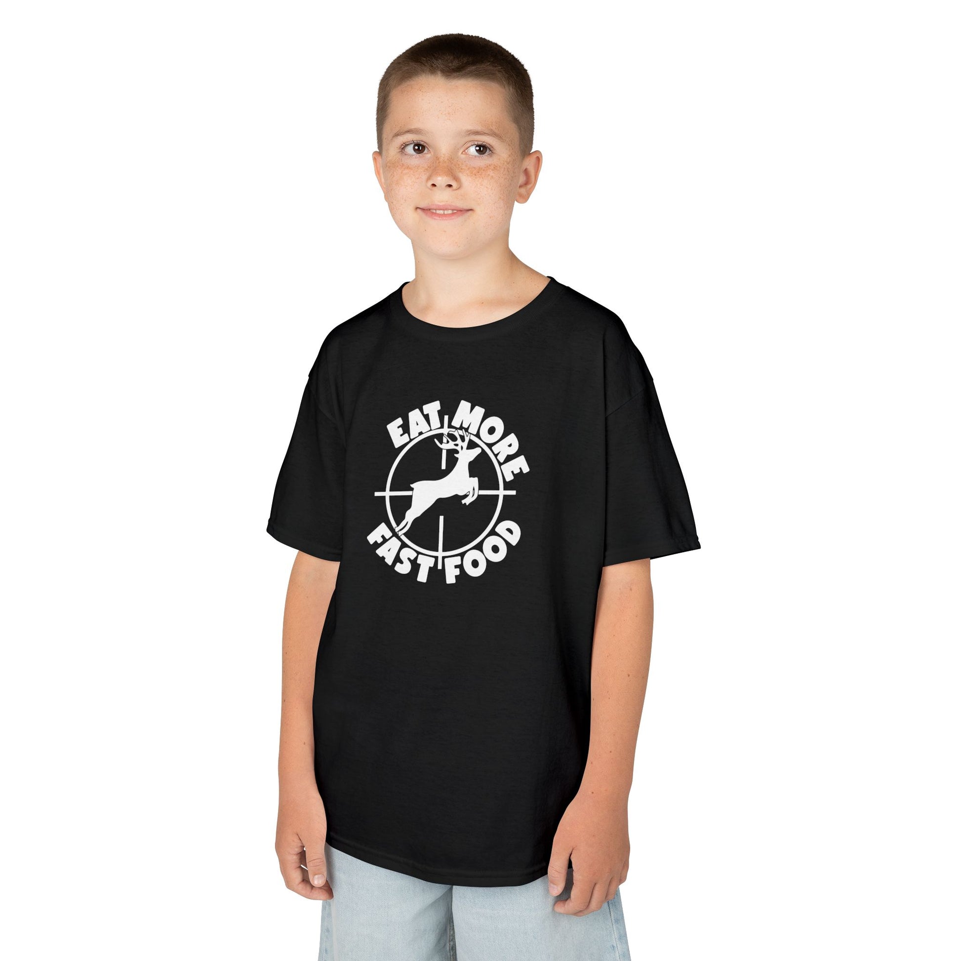 Child wearing a black t-shirt with a graphic design on a white background
