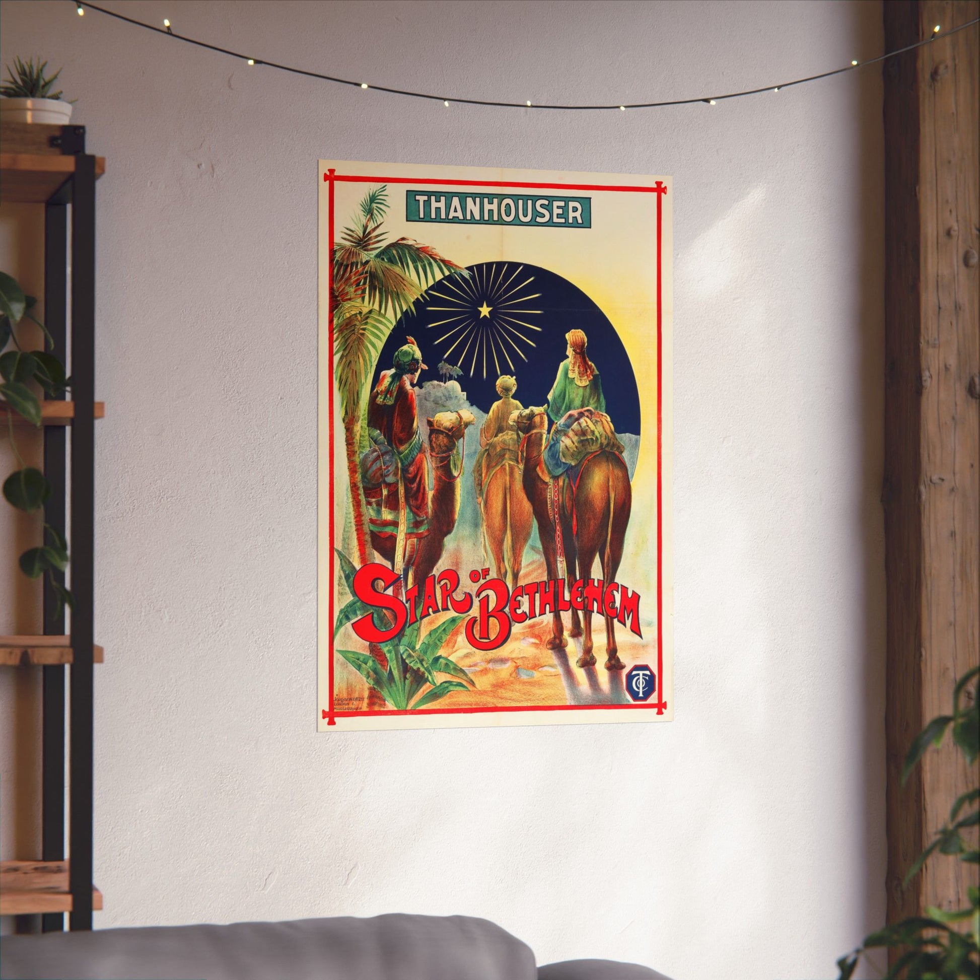 Vintage movie poster for 'Star of Bethlehem' by Thanhouser on a wall in a room with plants and a shelf.