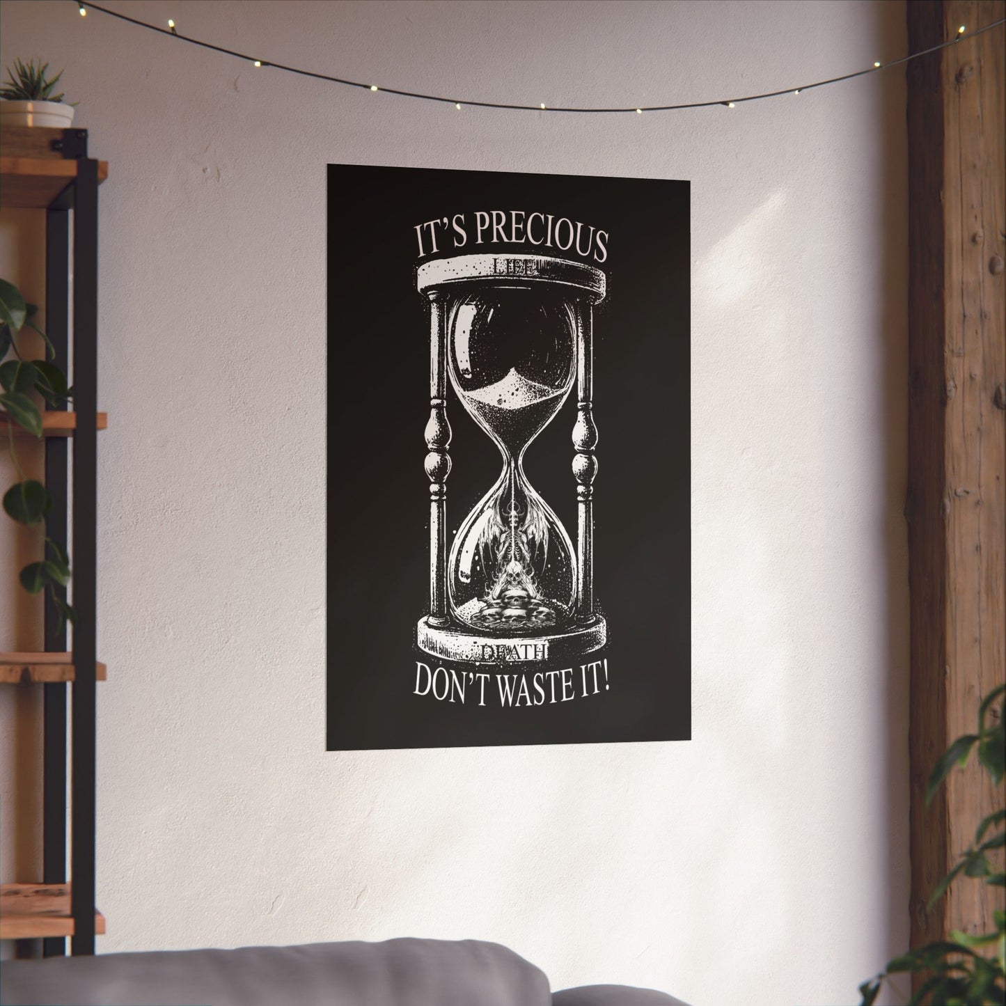 Poster with an hourglass design and motivational text on a wall in a room.