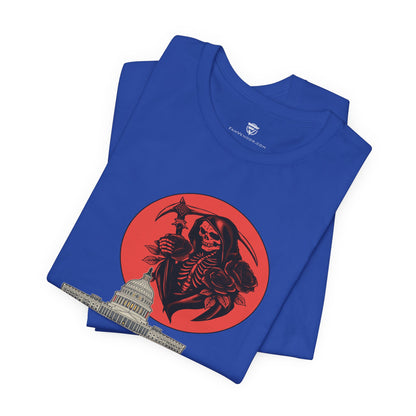Blue t-shirt with a red graphic of a skeleton holding a scythe and a building, on a white background.
