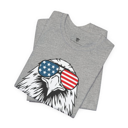 Gray t-shirt with an eagle wearing American flag sunglasses design on a white background