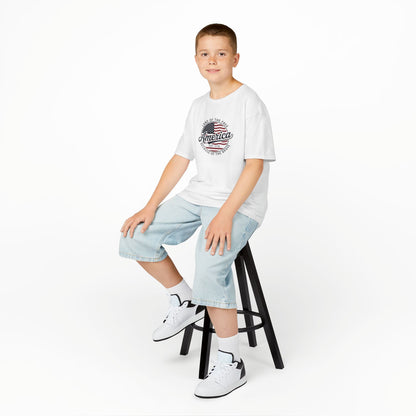 Child sitting on a stool wearing a white t-shirt with colorful text and light blue jeans on a white background