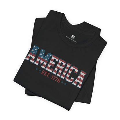 Black t-shirt with 'America EST. 1776' design on a white background