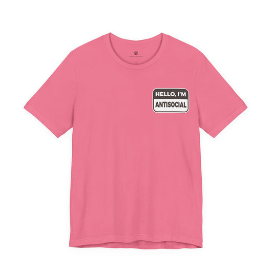 Pink t-shirt with a label reading 'HELLO, I'M ANTISOCIAL' on a white background
