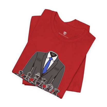 Folded red t-shirt with a suit and tie graphic on a white background